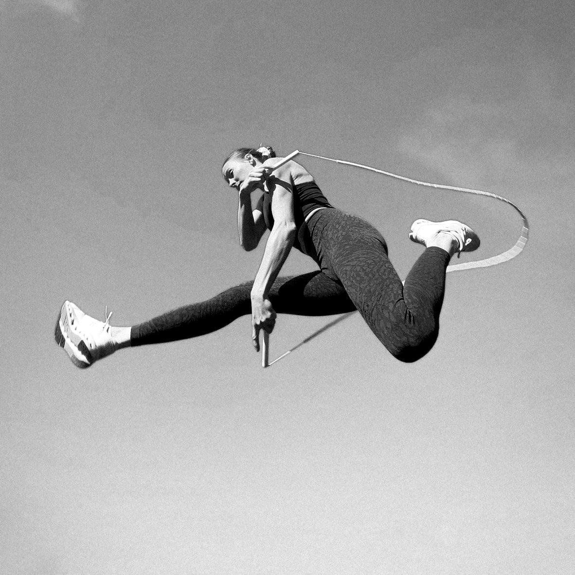 Impressive skipping skill with triple under under the leg and crossed arms